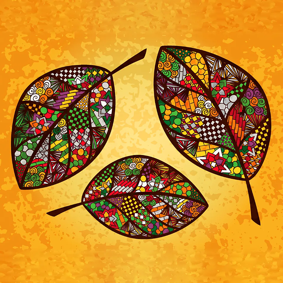 Three patterned leaves on an orange background